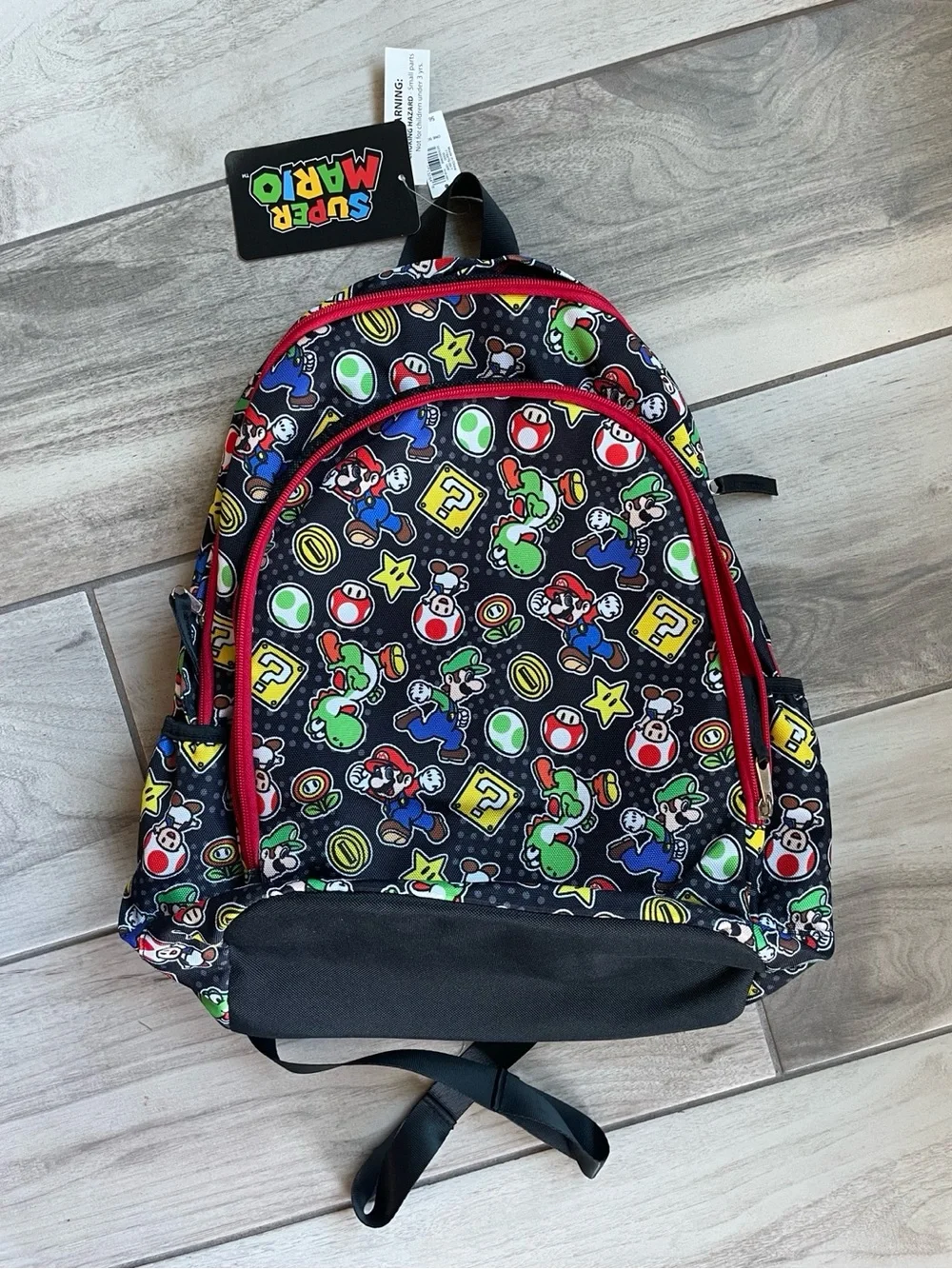 Nintendo Black Kids Backpack with Multicolor Mario Print and Red Trim